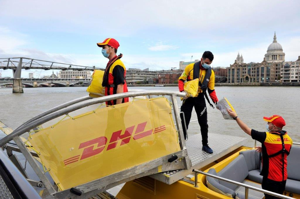 DHL riverboat handover with St Pauls